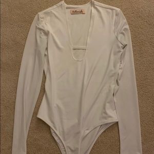 Kittenish body suit